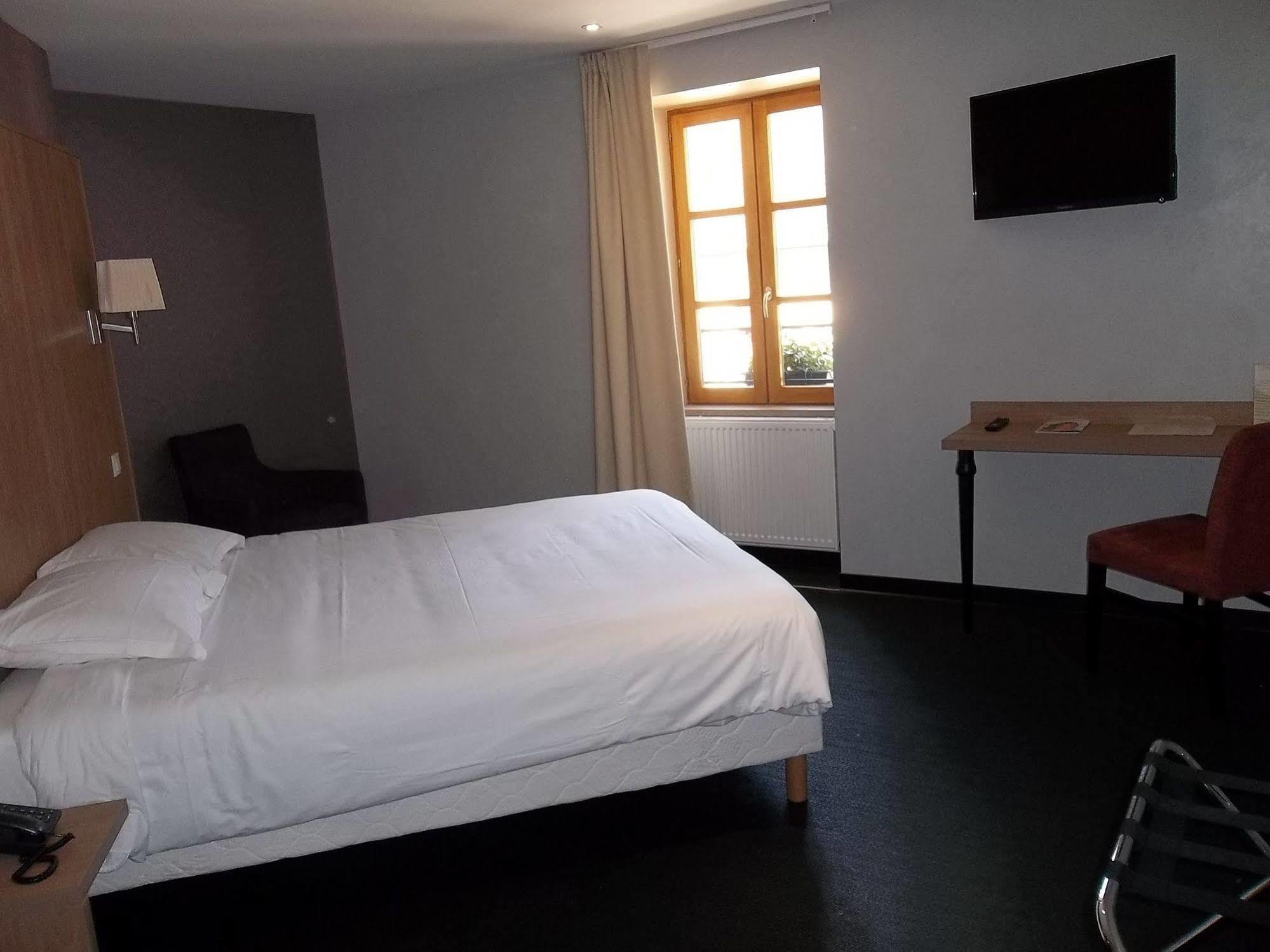 Logis L'Hotel D'Arc Arc-sur-Tille Екстер'єр фото